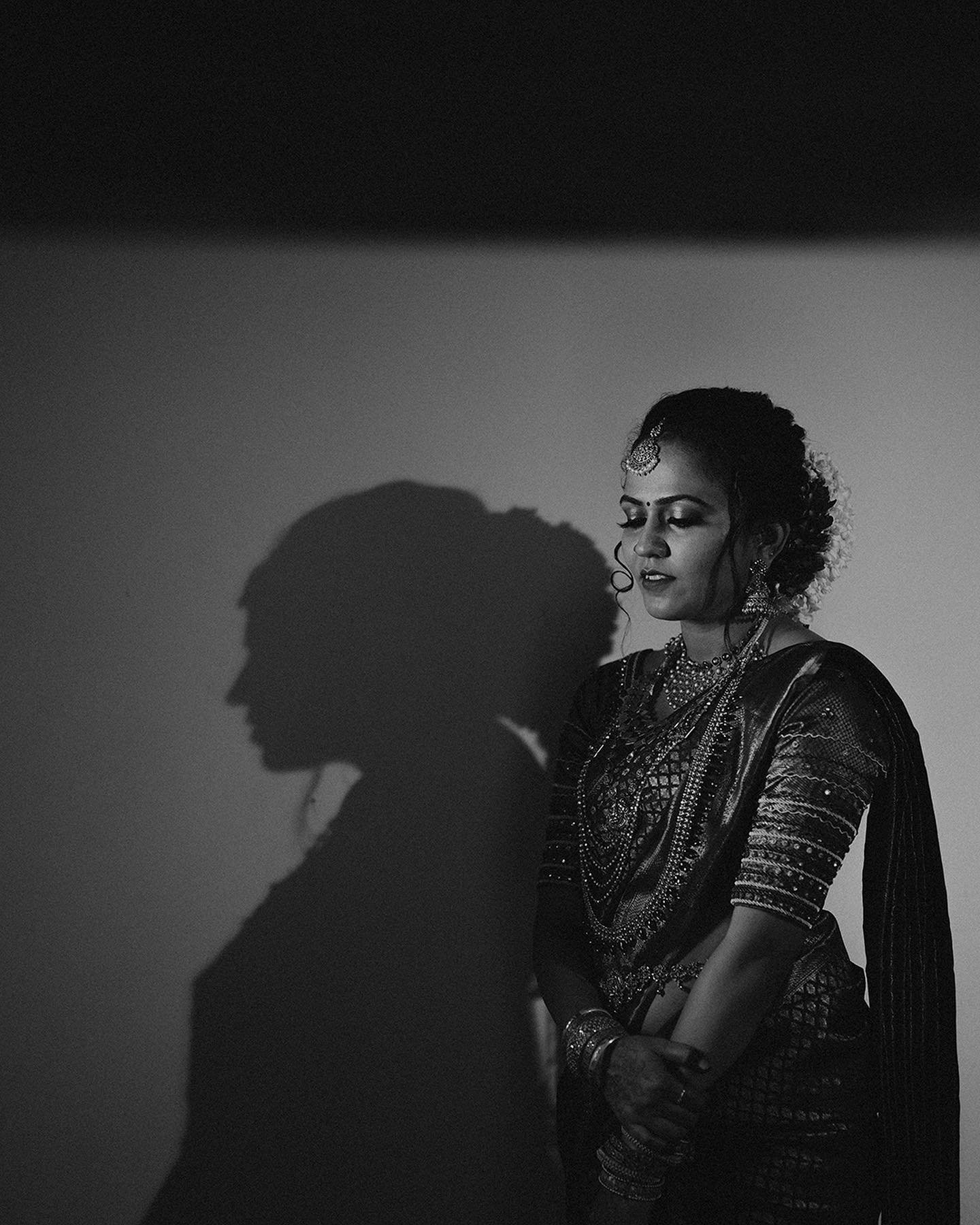 A dramatic bridal portrait with a soft shadow